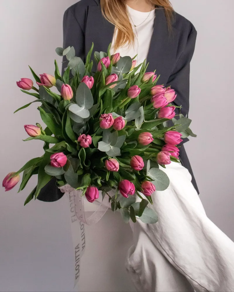 Delightful tulip and eucalyptus arrangement