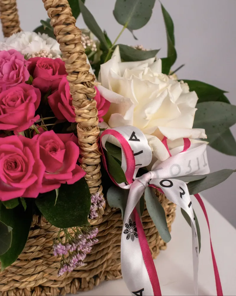 Charming basket of pink and white roses