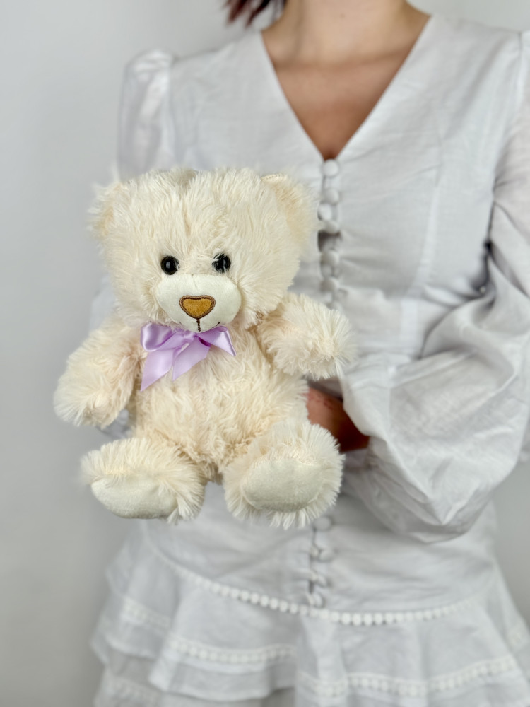 Cream teddy bear with lavender bow — Floritta gift delivery