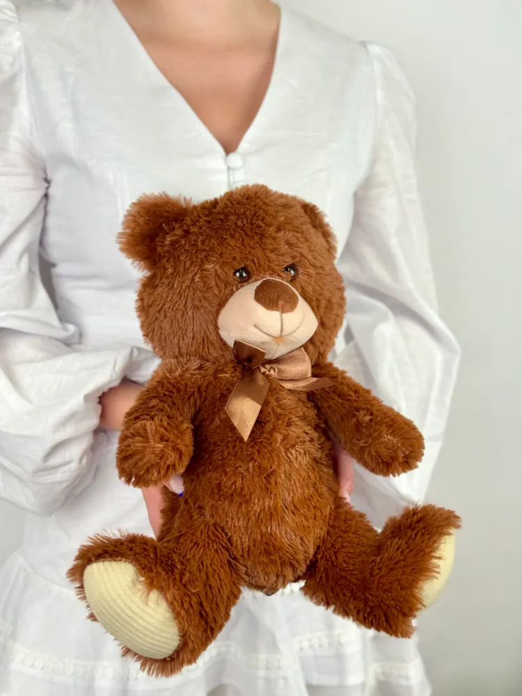 This image shows a teddy bear, not a floral product — Floritta