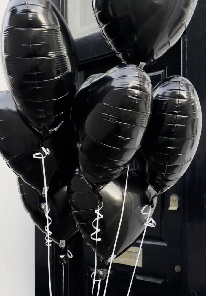 Black heart-shaped (7 balloons helium inflated)