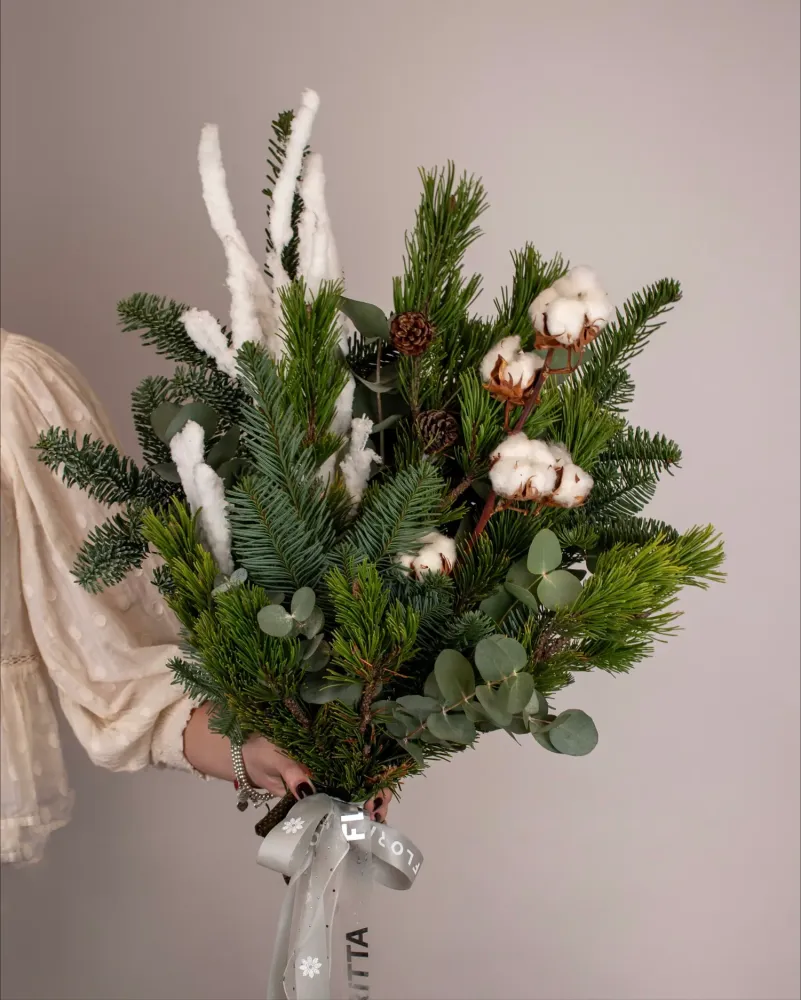 Cotton and evergreen foliage tied bouquet with Floritta ribbon — same-day London delivery