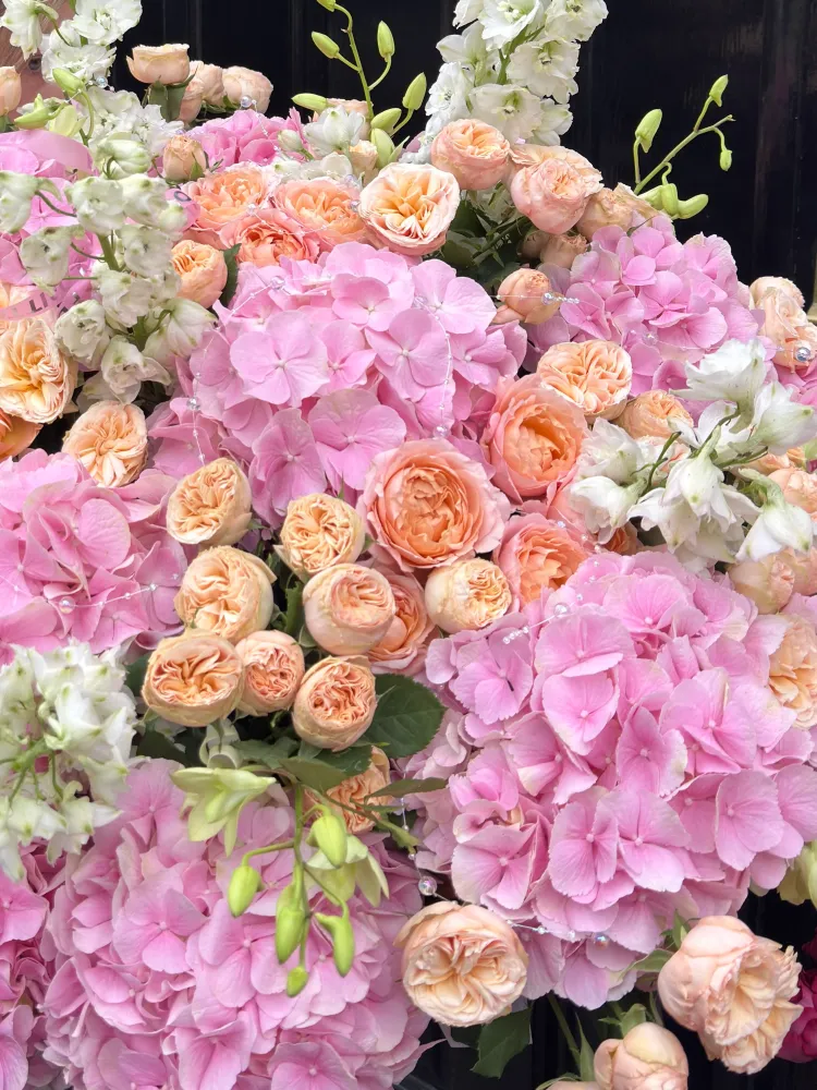 Apricot blush basket (hydrangeas, peony spray roses & delphinium)