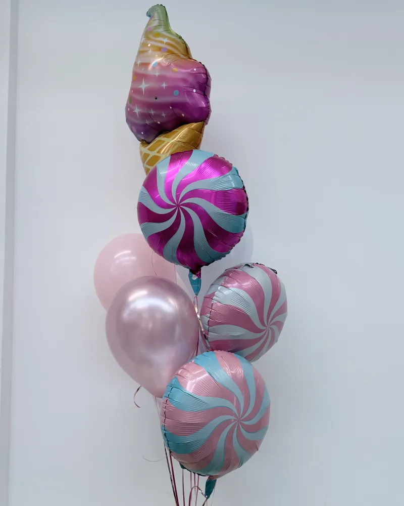 Festive balloon bouquet with magenta, pink and teal swirls — Floritta