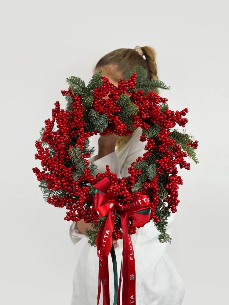 Festive red berry and evergreen Christmas wreath with Floritta ribbon bow