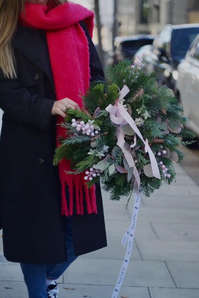 Hand-tied festive bouquet with skimmia berries, mixed greenery and pale pink bow — Floritta