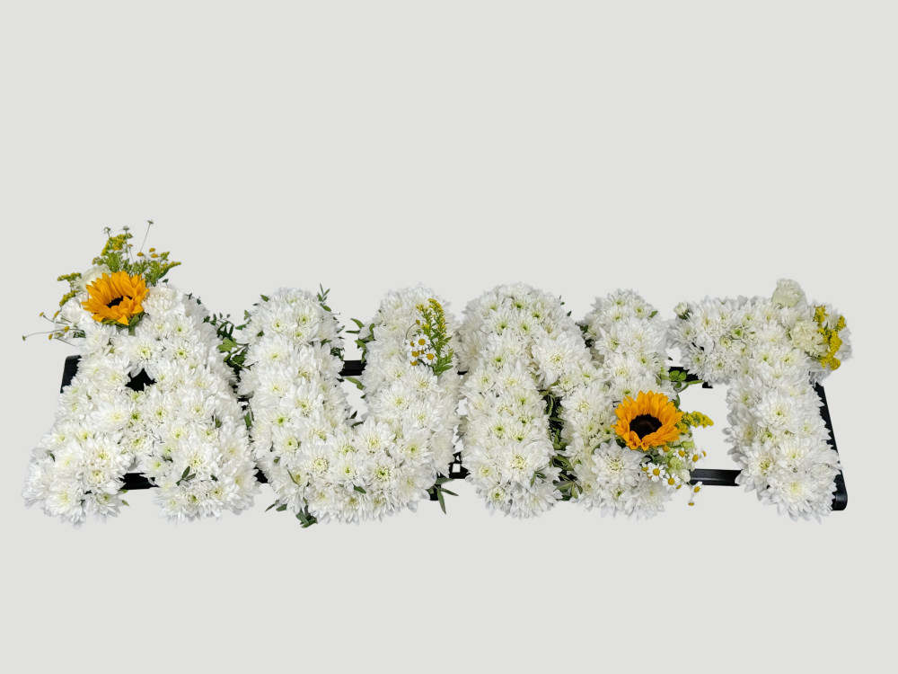 Abundant white chrysanthemums and sunflowers funeral tribute — Floritta