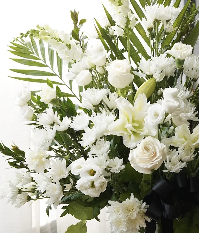 Peaceful dawn sympathy arrangement (roses, eustoma & chrysanthemums)