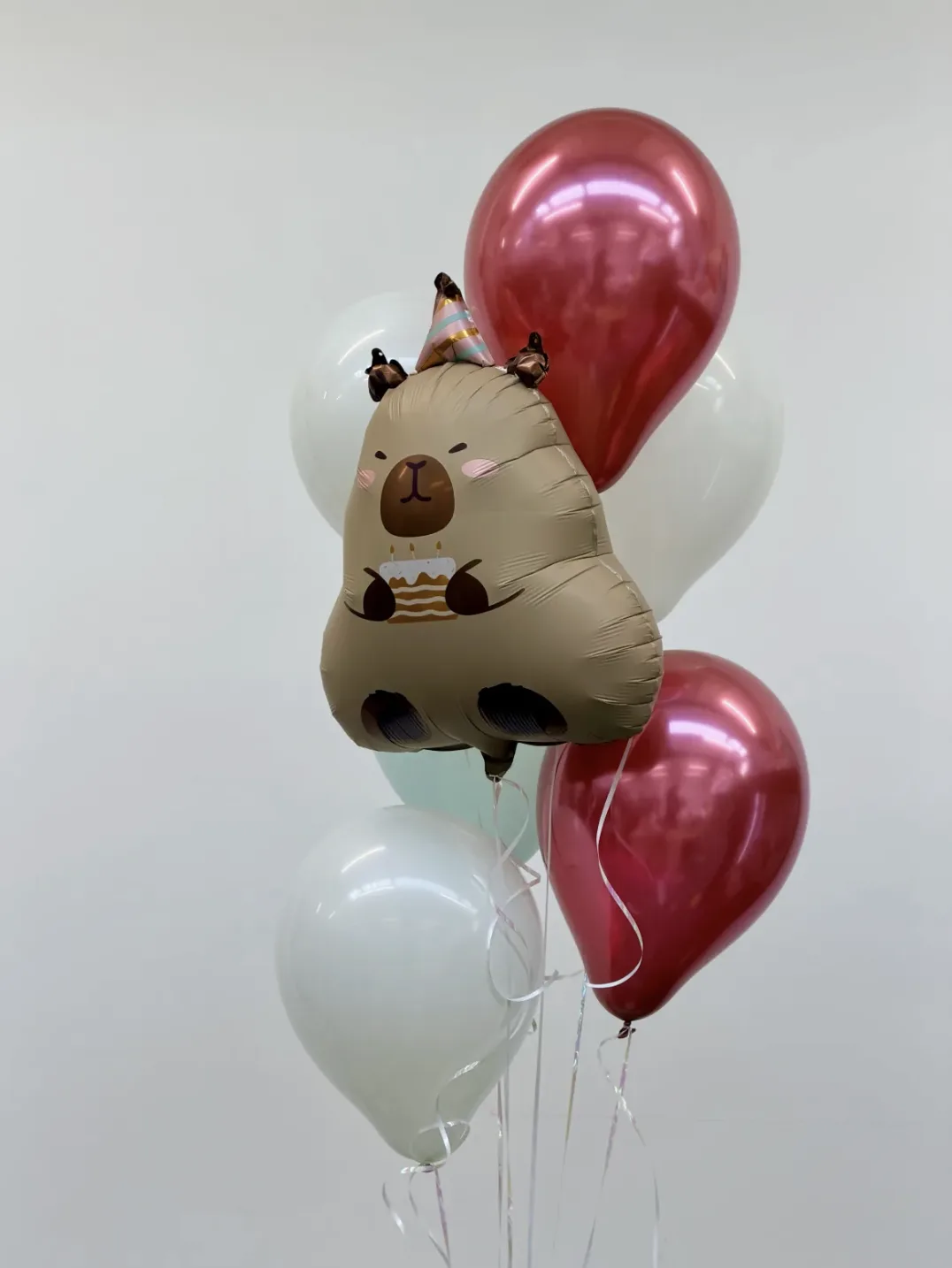 Cheerful capybara party (7 balloons helium inflated)