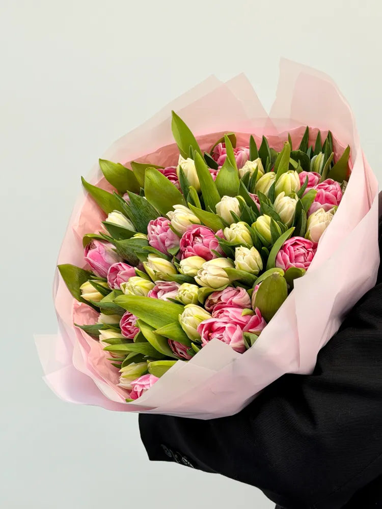 Lush pink and cream tulip bouquet with ti leaf in pale pink wrap — Floritta
