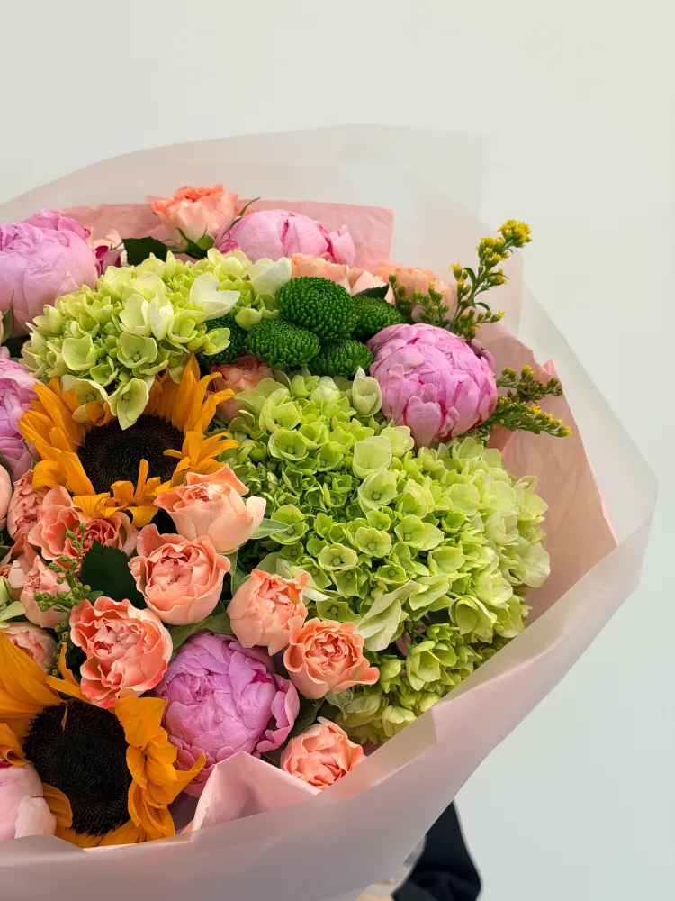 Golden reverie (hydrangeas, spray roses & sunflowers)