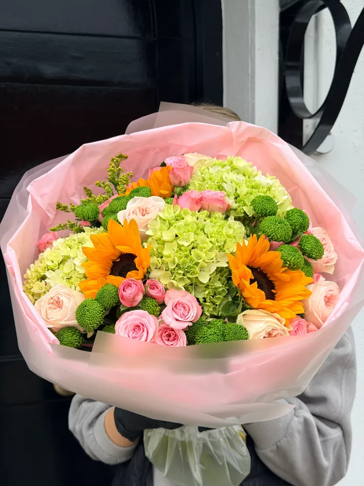 Golden reverie (hydrangeas, spray roses & sunflowers)