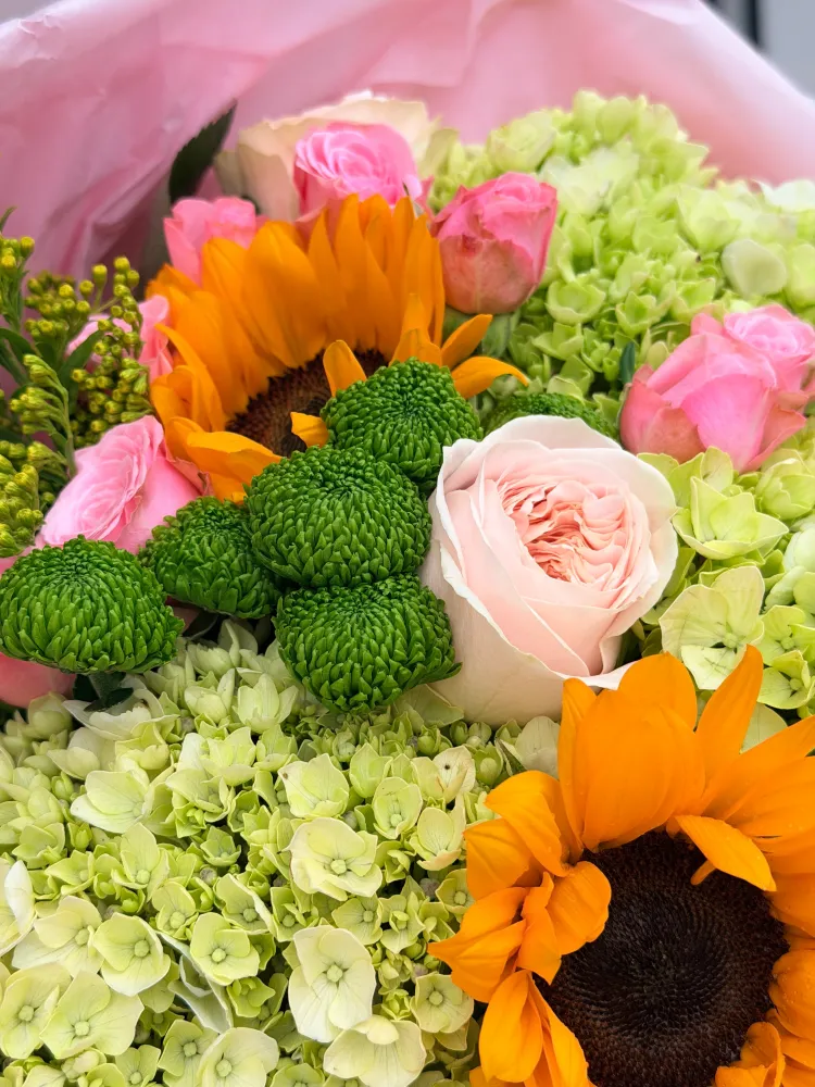 Golden reverie (hydrangeas, spray roses & sunflowers)