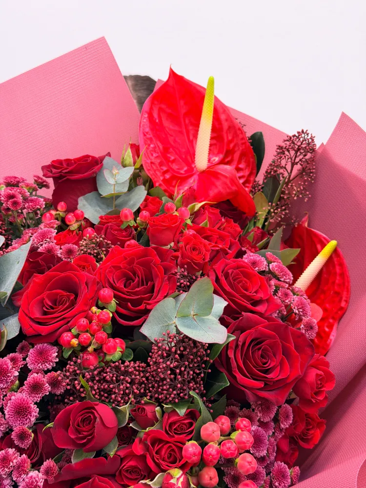 Velvet ember mix (roses, anthurium, chrysanthemums & skimmia)