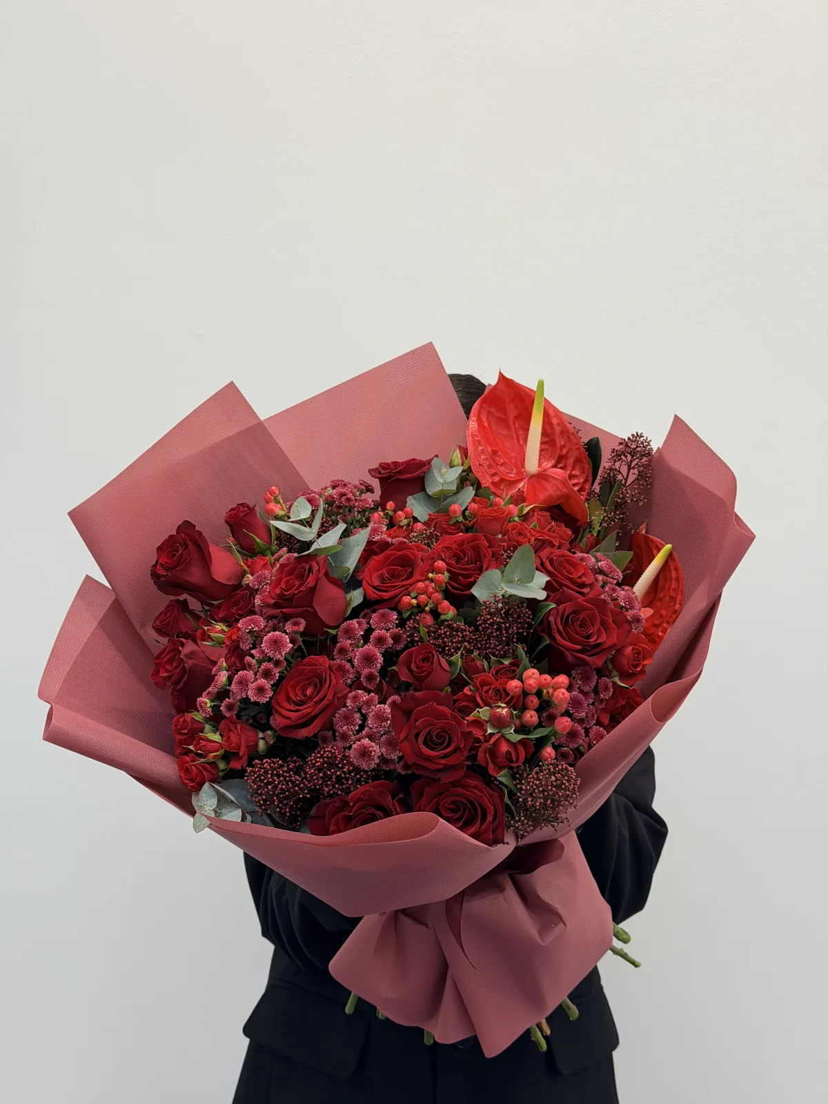 Velvet ember mix (roses, anthurium, chrysanthemums & skimmia)
