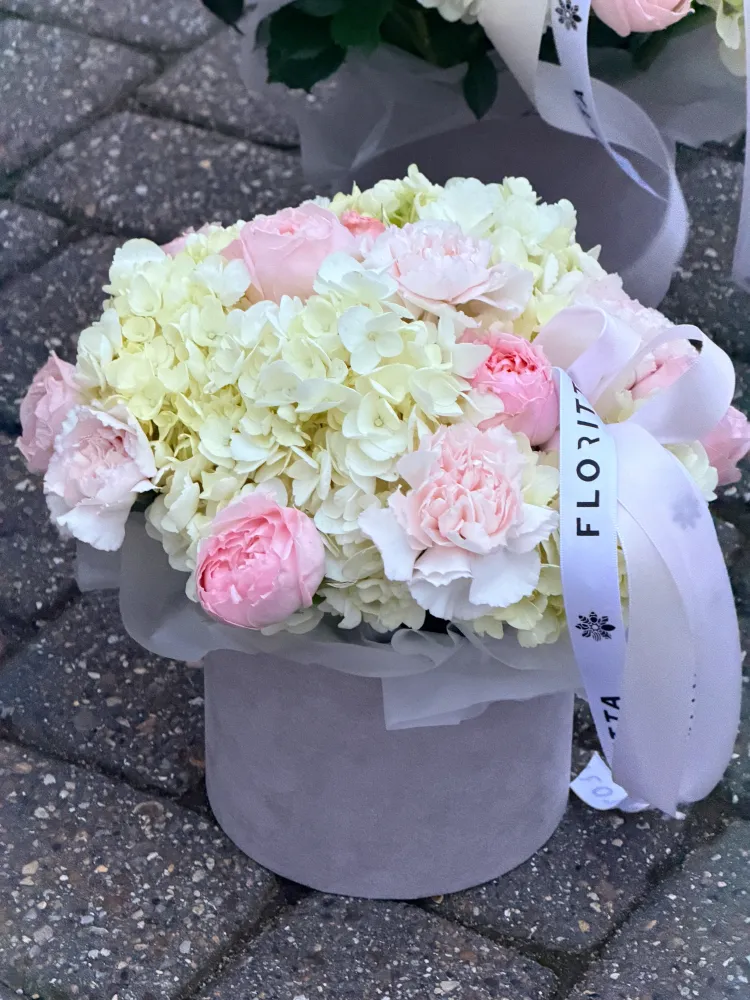 Full pale pink and cream peony hydrangea arrangement in grey velvet box — Floritta