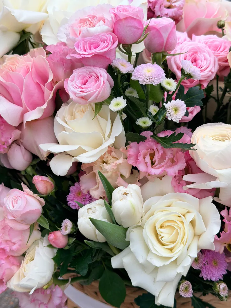Pastel stillness floral basket (roses, eustomas & spray roses)