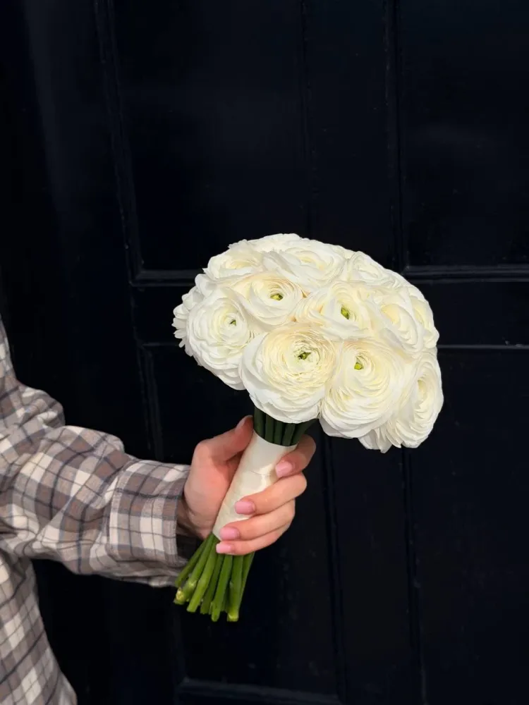 Luxurious white ranunculus hand-tied bouquet with cream wrap — Floritta