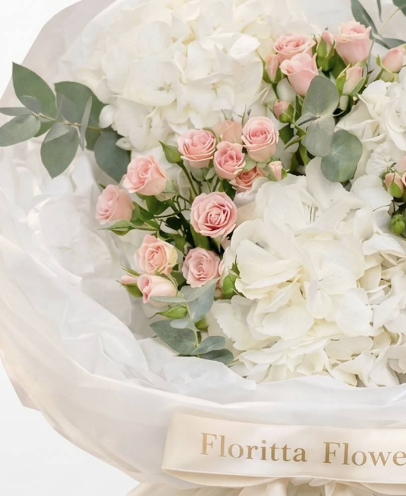 Petal whisper ( spray roses, hydrangea )