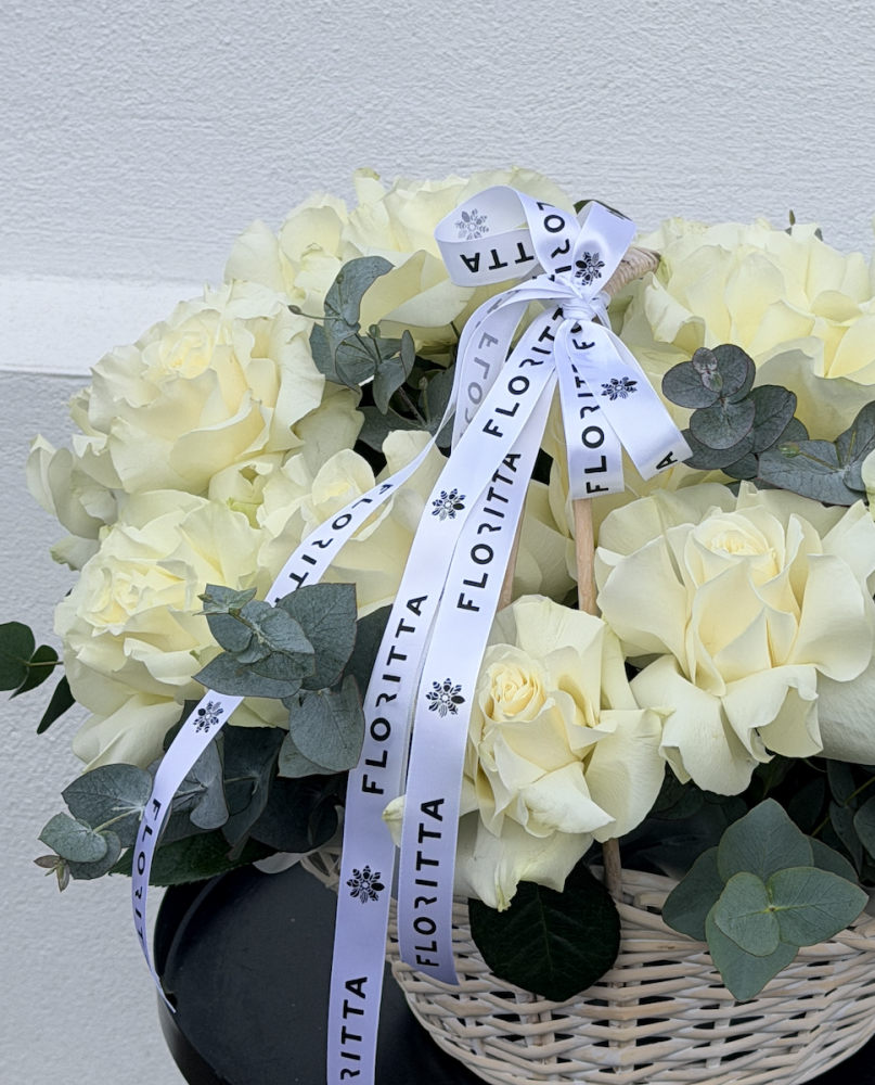 20 white french roses in the basket