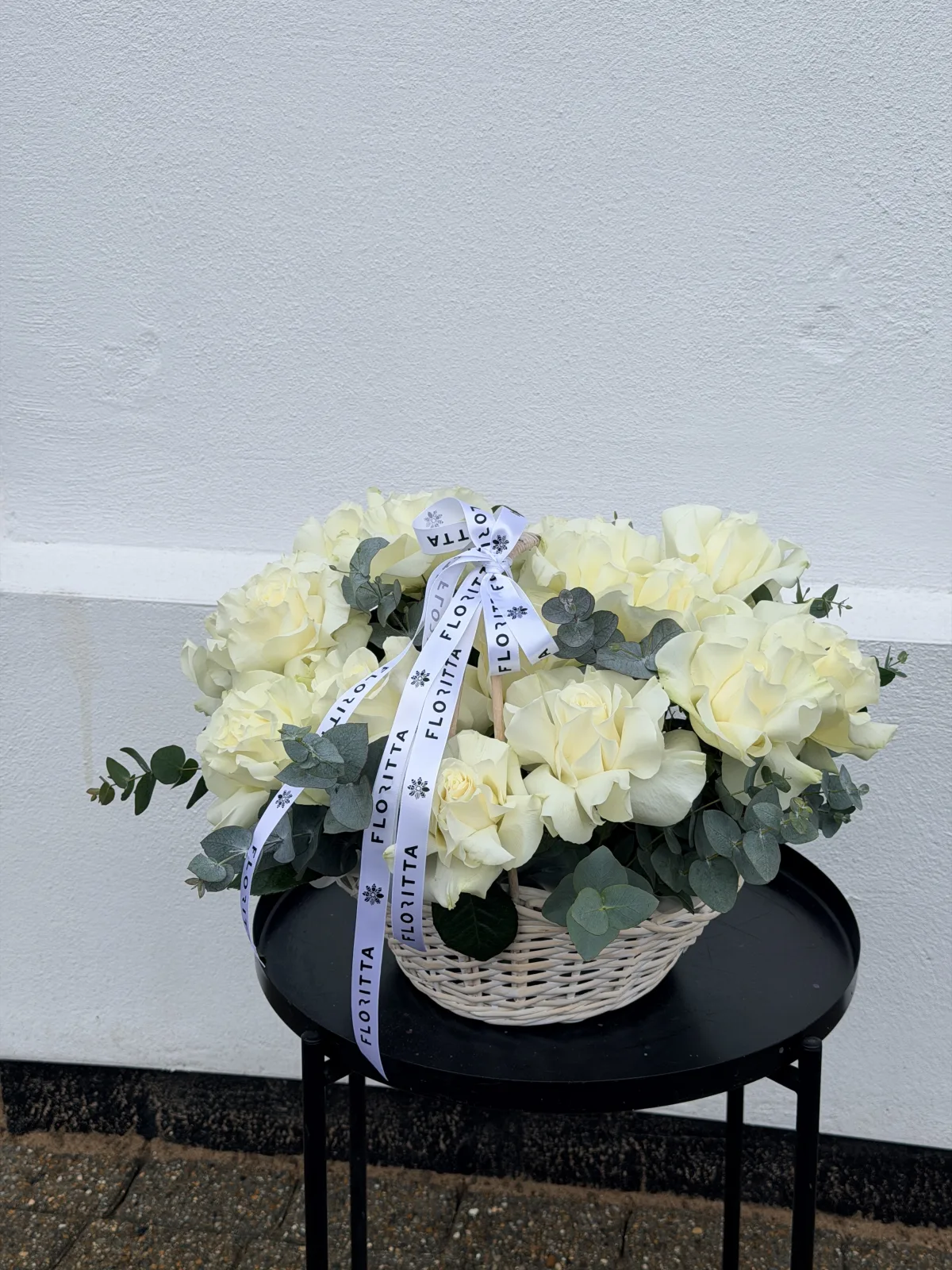 20 white french roses in the basket