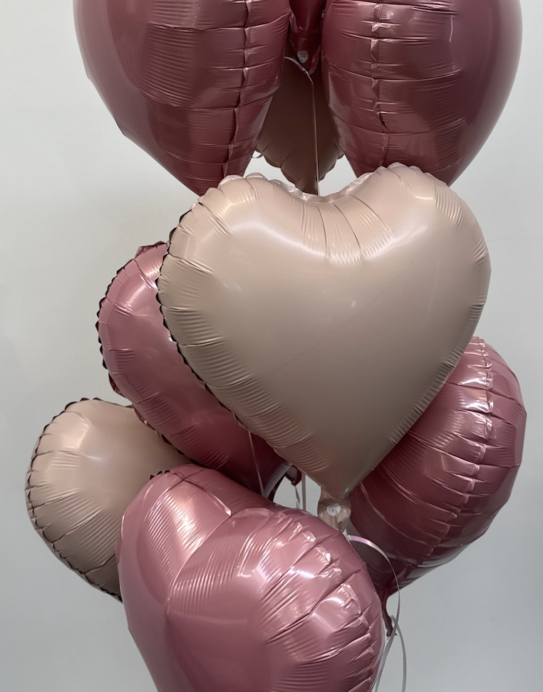 10 pink heart balloons (helium inflated)