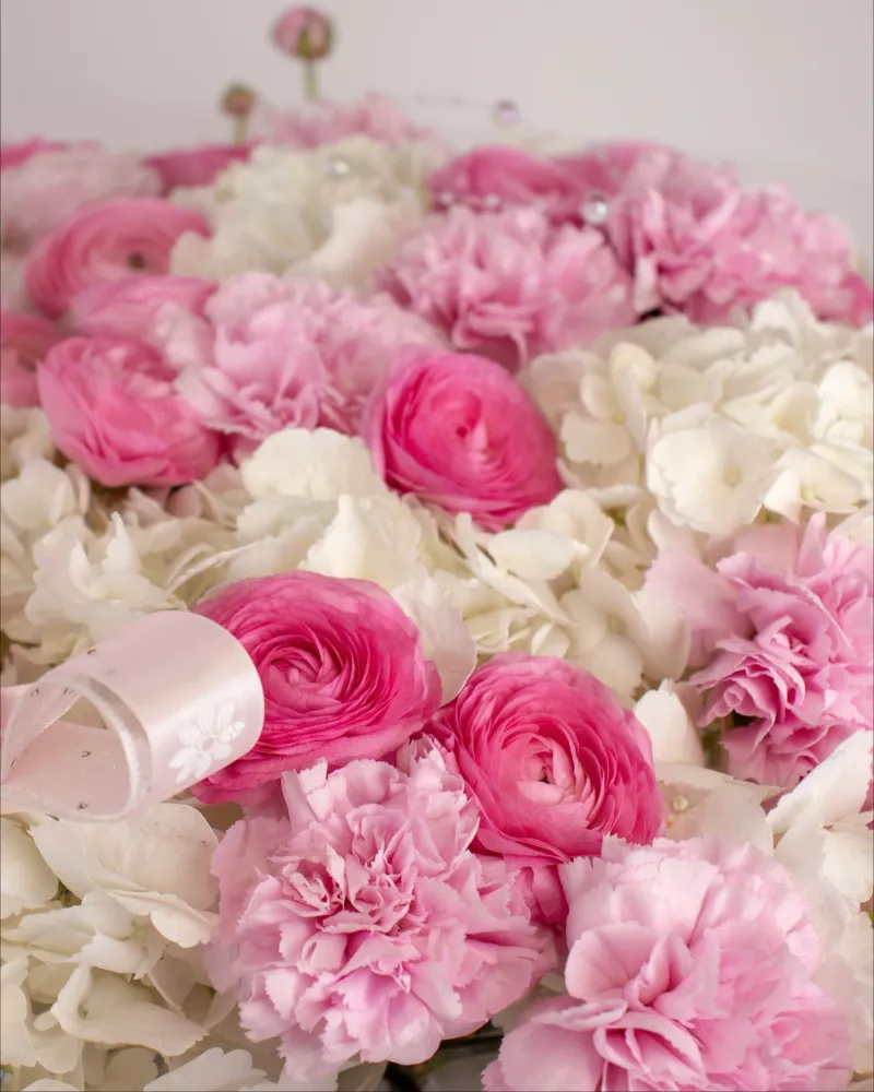 Adoration in bloom (hydrangeas, dianthus & ranunculus)