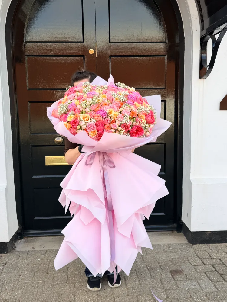 Sunset chelsea posy (rose, spray rose, carnation, gypsophila)
