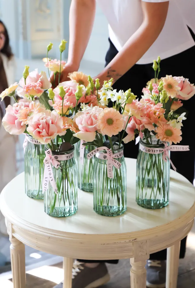 Blush gerberas, carnations and roses in woven seagrass basket — Floritta
