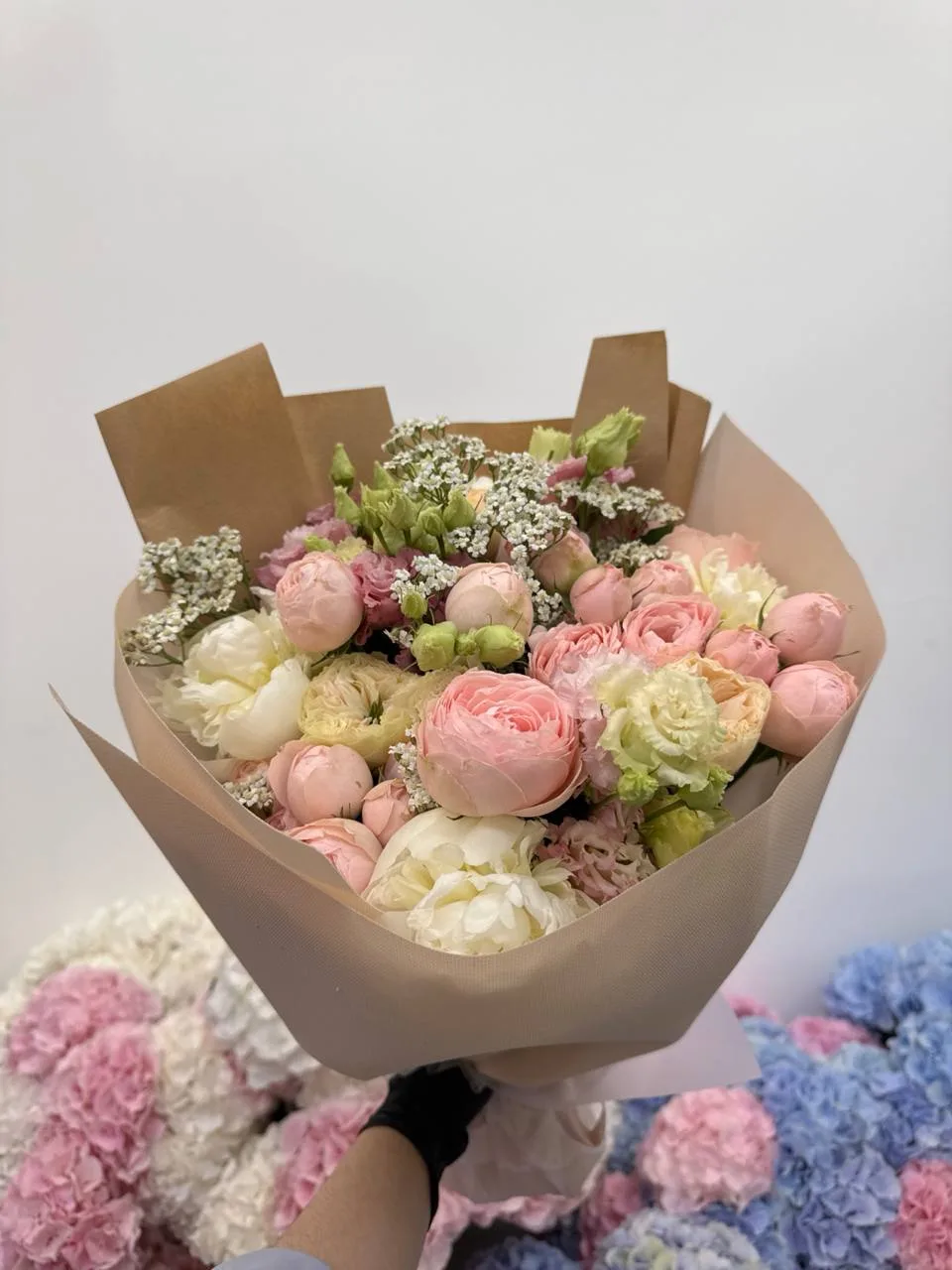 Peach garden posy (spray roses, peony roses & lisianthus)