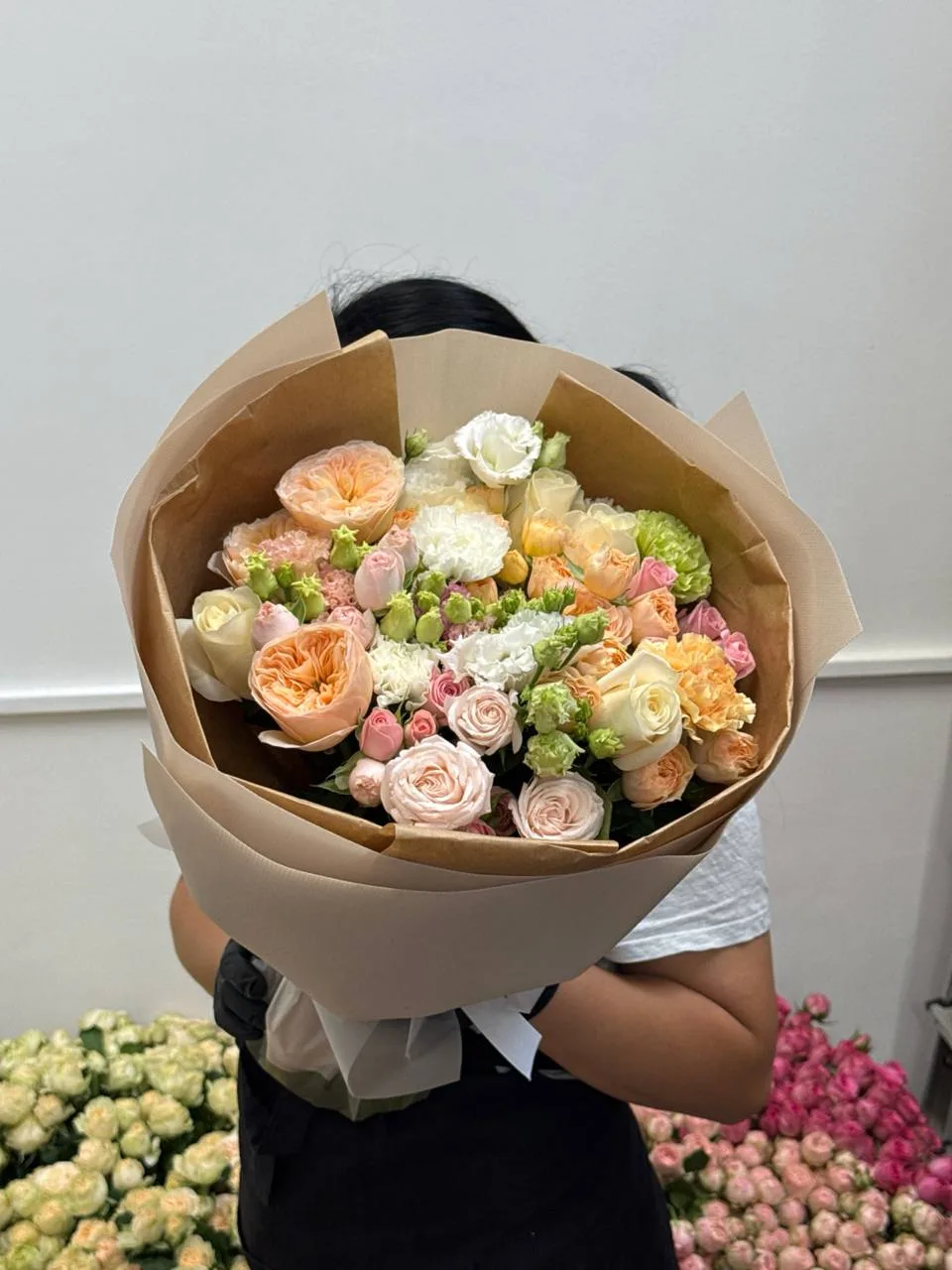 Peach garden posy (spray roses, peony roses & lisianthus)