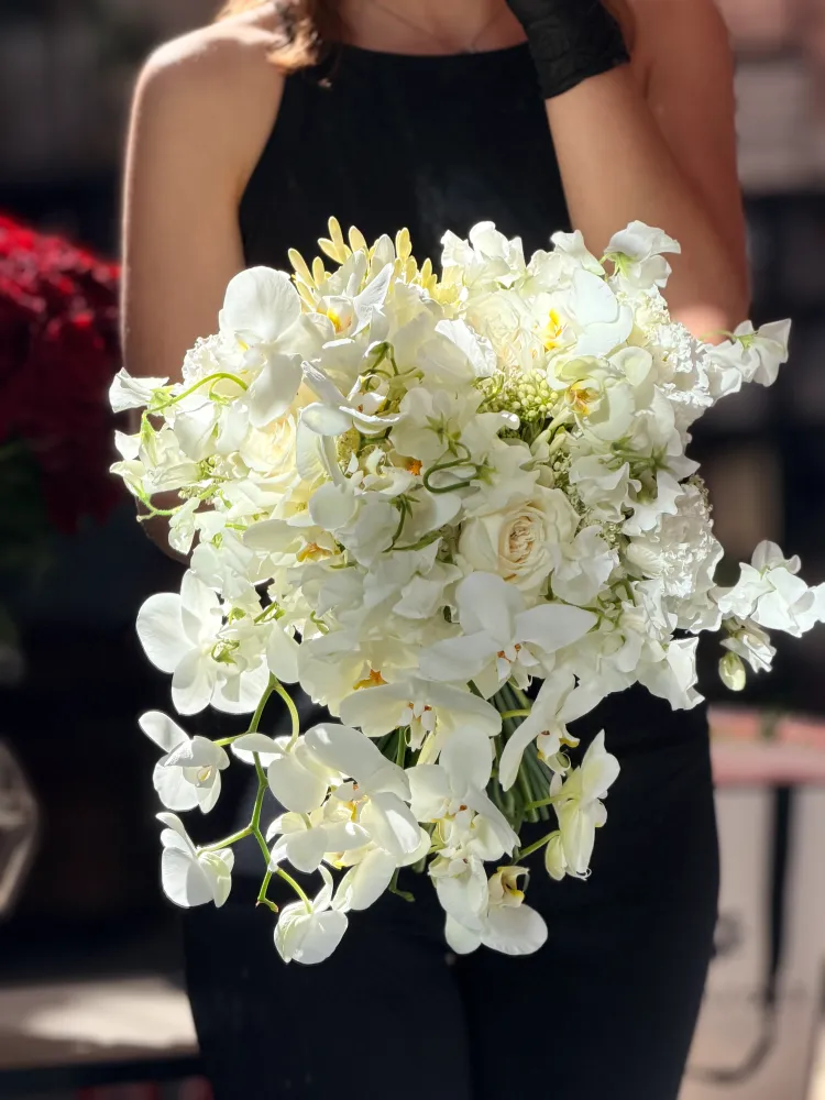 Luxurious white orchid and cream rose cascading bridal bouquet — Floritta
