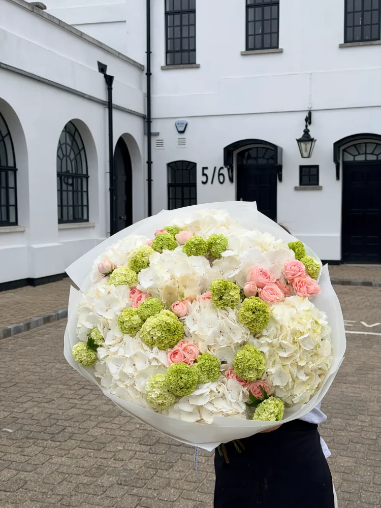 Apple blossom lane (hydrangea, viburnum & spray roses)