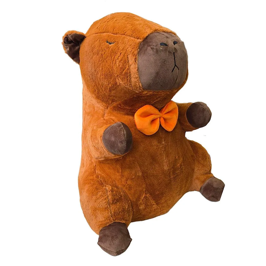 Cuddly capybara plush with orange bow tie