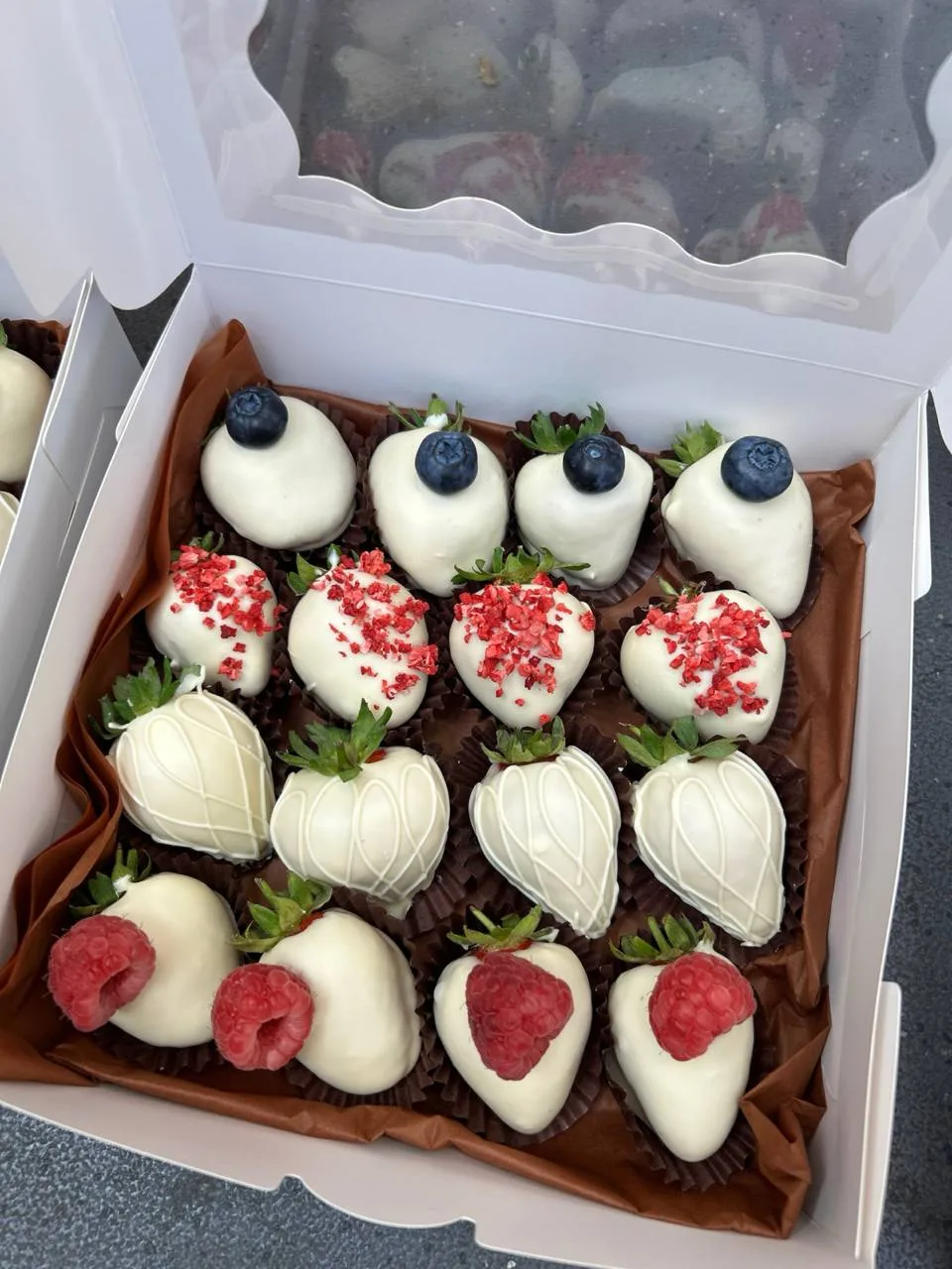 White chocolate strawberries box with berries