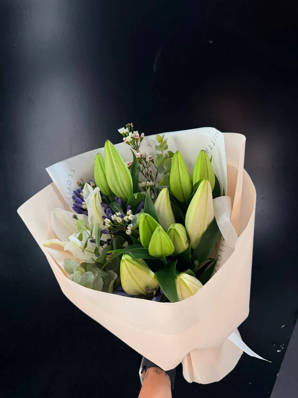 White lily bouquet with purple hyacinth & eucalyptus
