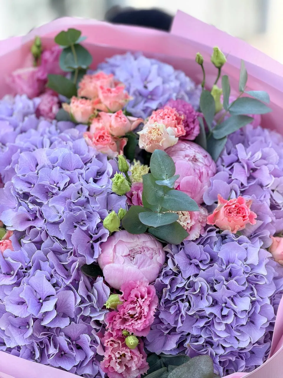 Lavender Hill (lilac-purple hydrangeas, coral peony spray roses, lisianthus, eucalyptus)