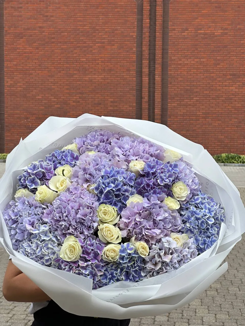 Periwinkle hydrangea bouquet with ivory garden roses