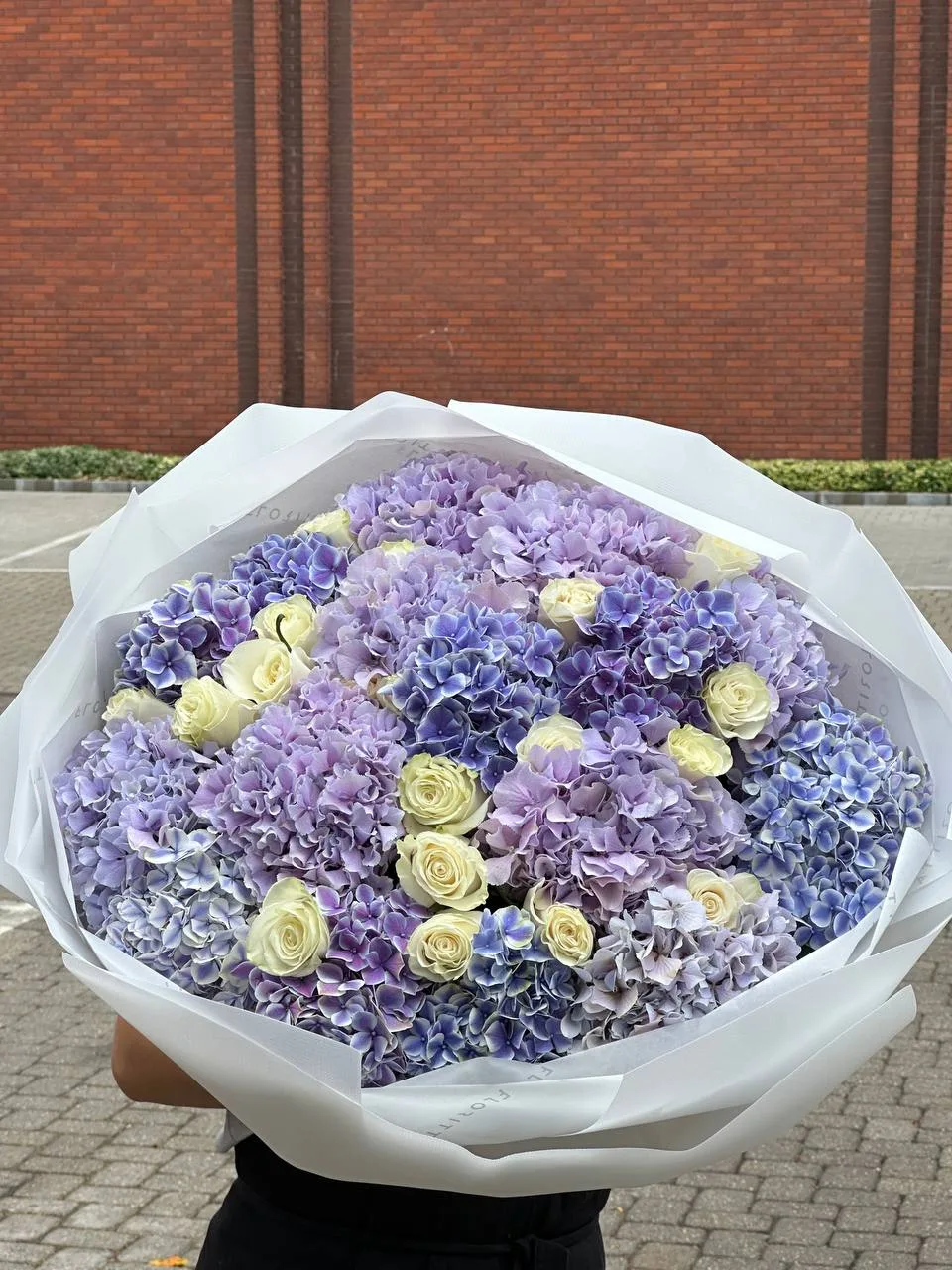 Periwinkle hydrangea bouquet with ivory garden roses