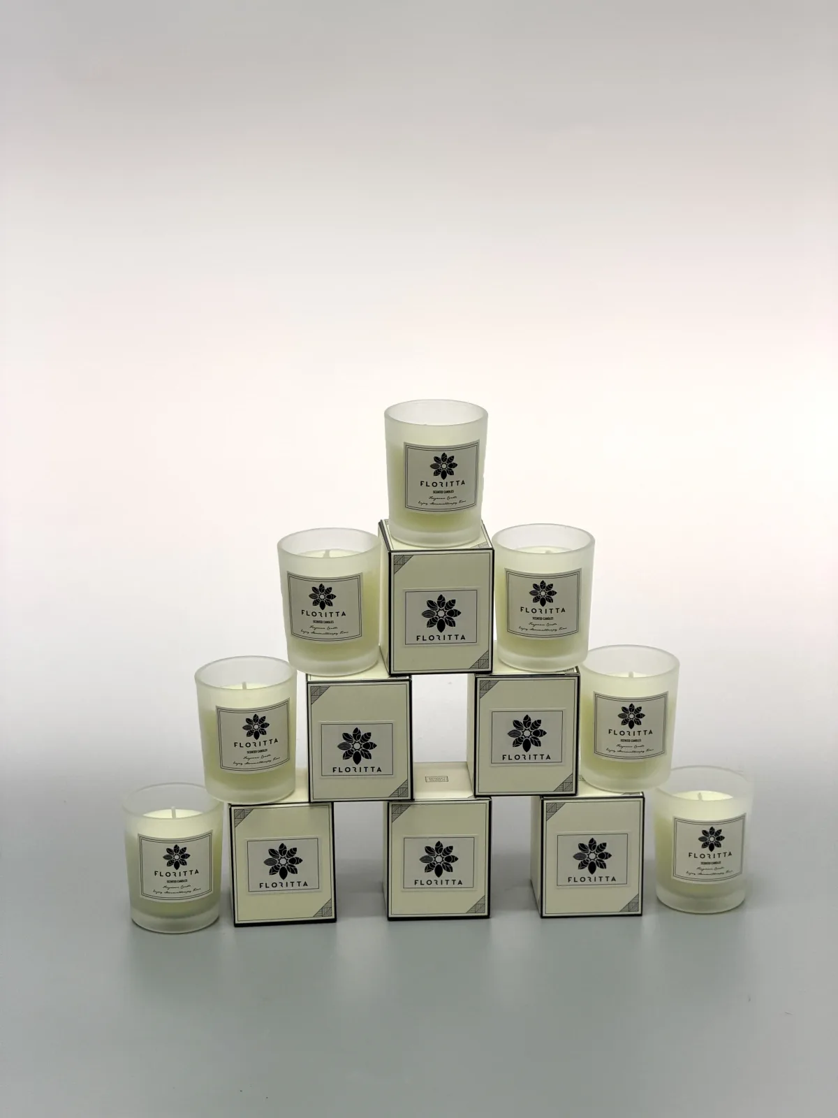 Floritta signature scented candle in white glass jar