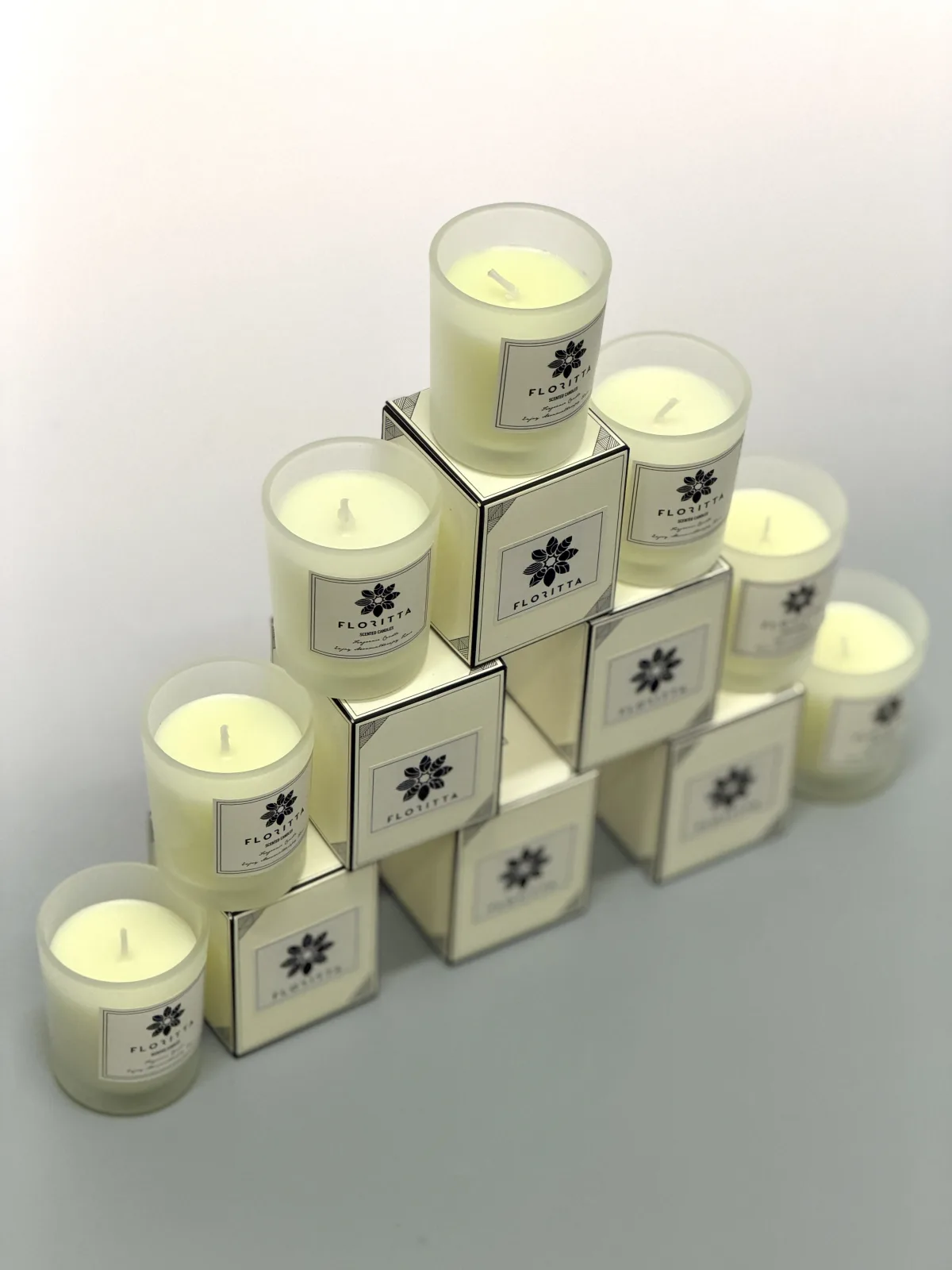 Floritta signature scented candle in white glass jar