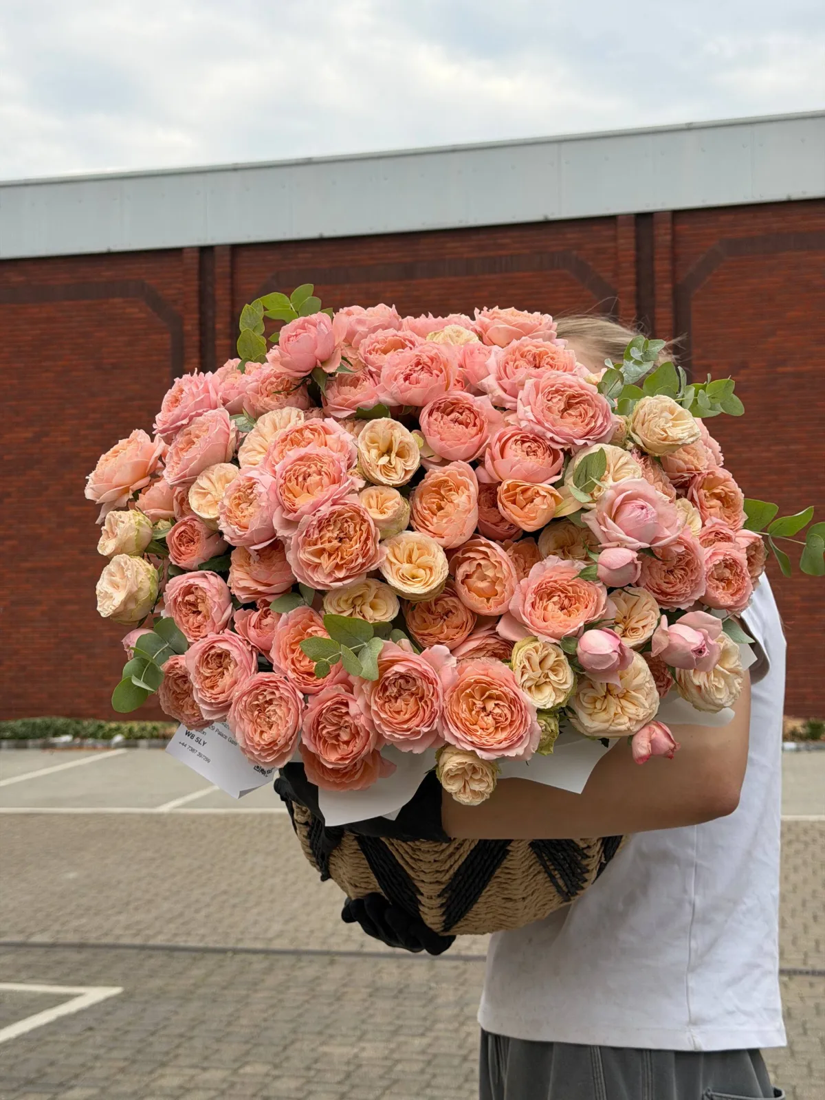 Peach & coral garden rose basket (garden roses, peony roses, eucalyptus)
