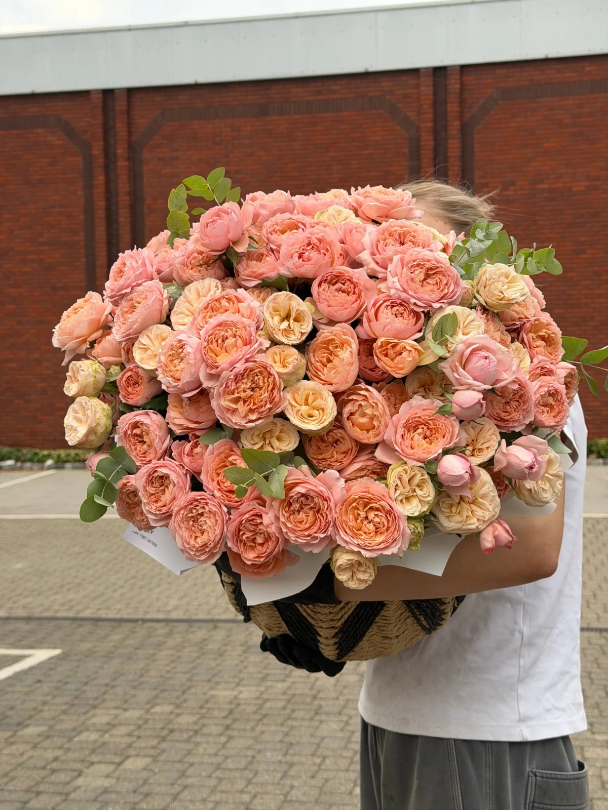 Peach & coral garden rose basket (garden roses, peony roses, eucalyptus)