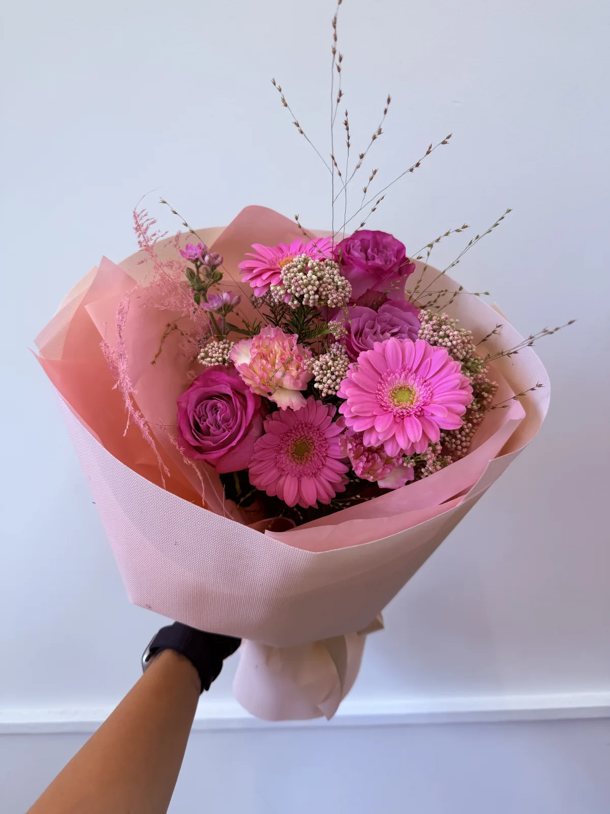 Magenta meadow bouquet (gerberas, roses)