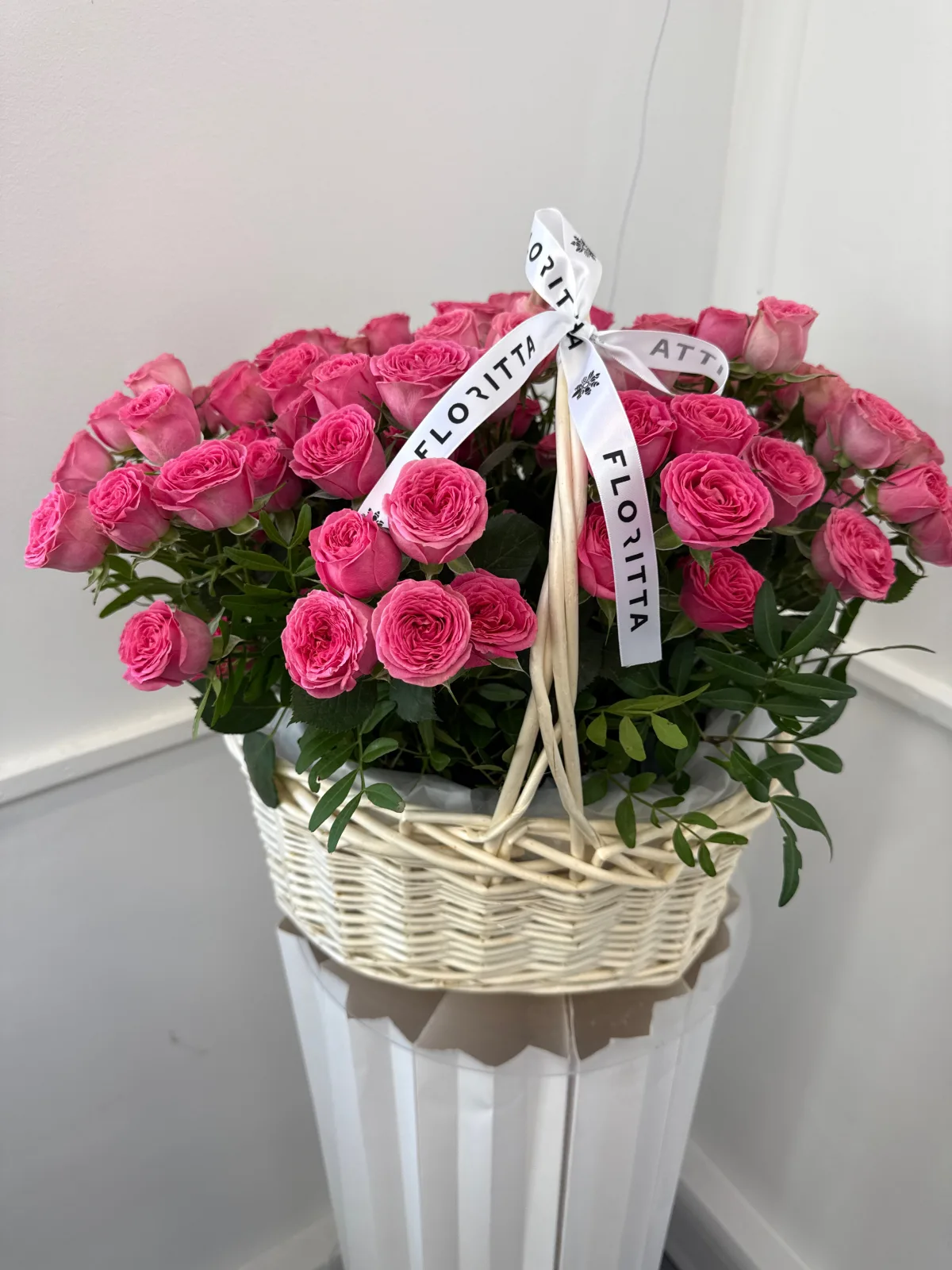 Hot pink rose basket in cream wicker