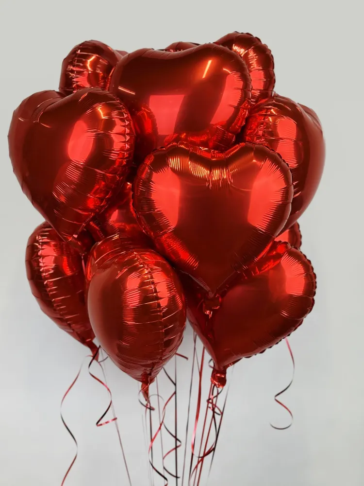 15 red heart foil balloons (helium inflated)