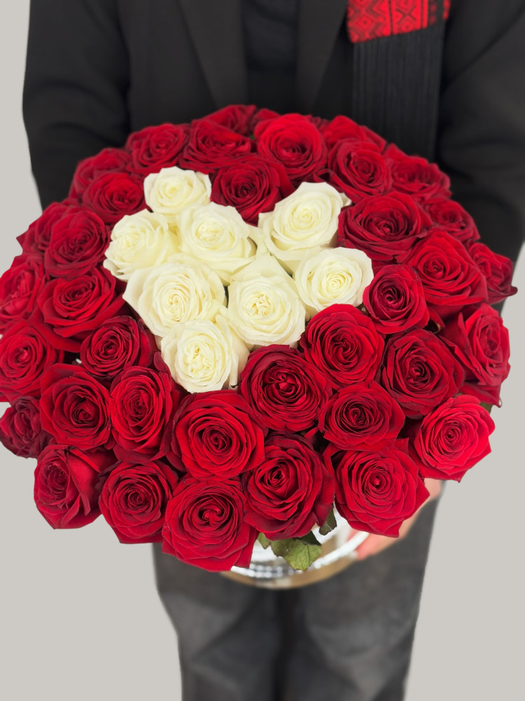 Heart-shaped red and white rose box